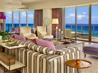 A living room with a sea view