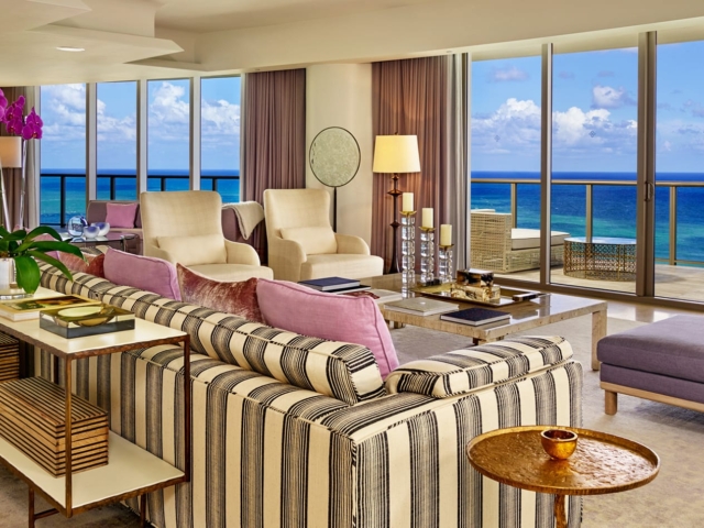 A living room with a sea view