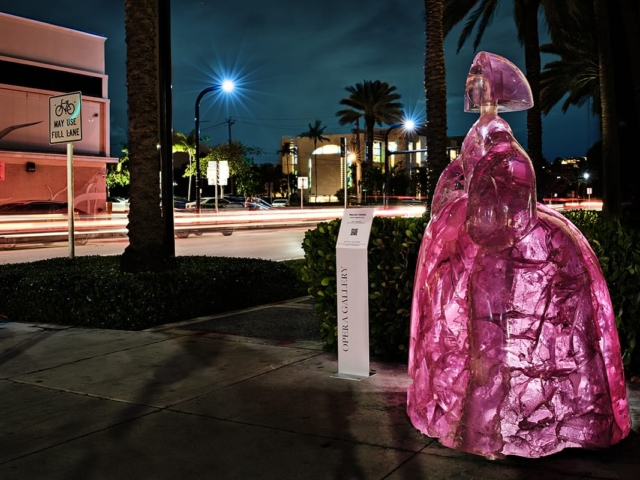 A pink sculpture at night