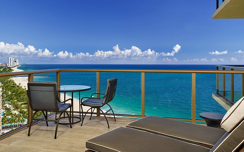 A balcony overlooking the ocean
