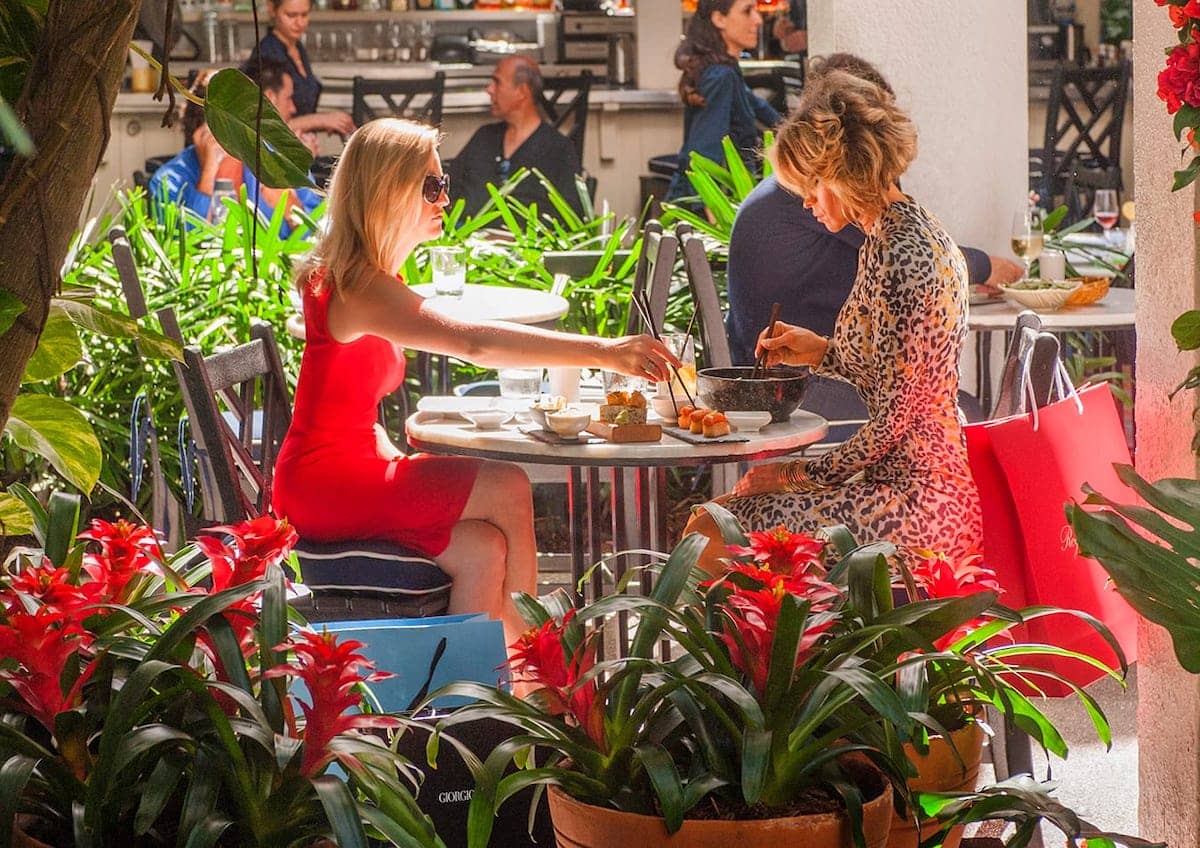 Two women eat lunch