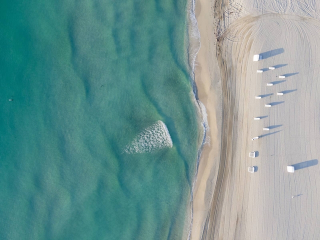 A beautiful sandy beach and blue waters