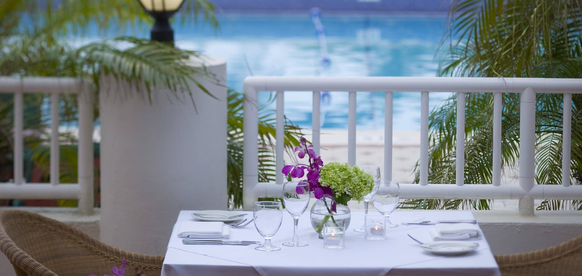 A dining table with a sea view